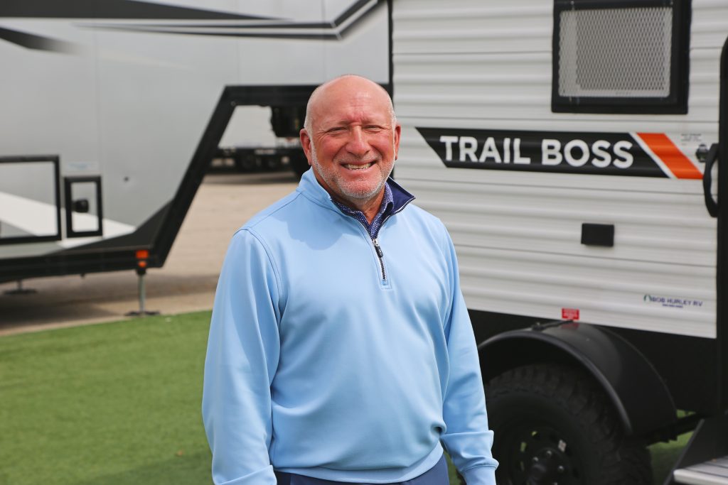 Bob Hurley poses in front of his RV business